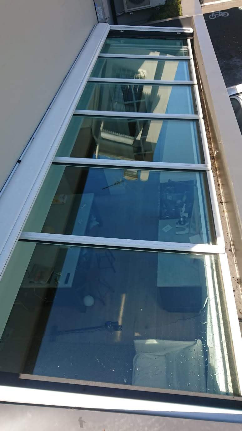 Row of clean glass roof panels